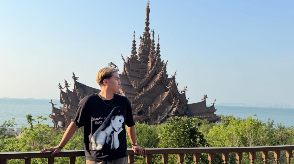 tourist taking a picture at the facade of sanctuary of truth